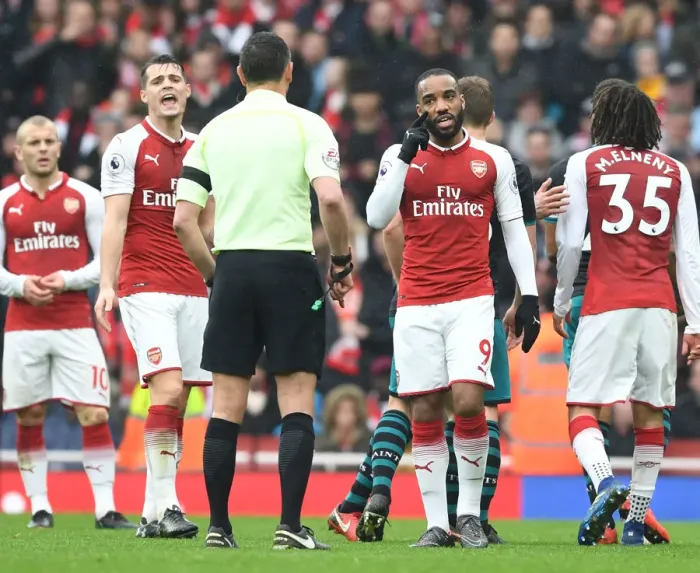 Framed Print : Arsenal's Xhaka and Lacazette Protest Referee Decision During Arsenal v Southampton Premier League Match