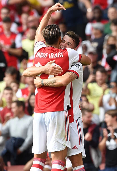 Arsenal's Xhaka and Mari Celebrate Goal Against Chelsea: Pre-Season Thriller at Emirates Stadium