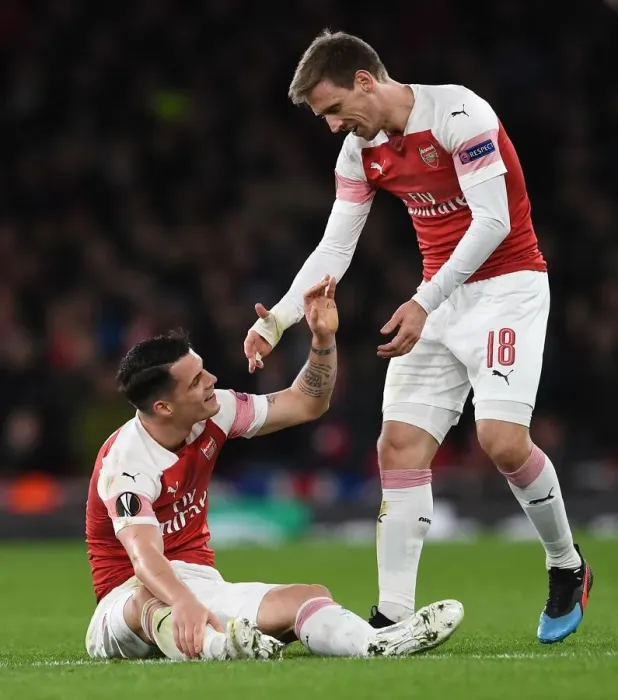 Framed Print : Arsenal's Xhaka and Monreal Focused During Europa League Clash Against Stade Rennais