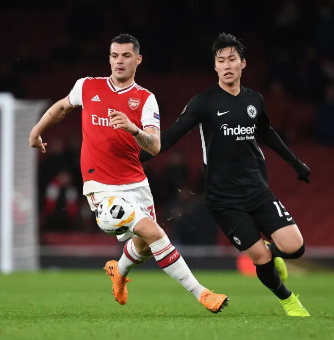 Framed Print : Arsenal's Xhaka Overpowers Eintracht Frankfurt in Europa League Clash Framed Print : Arsenal's Xhaka Overpowers Eintracht Frankfurt in Europa League Clash