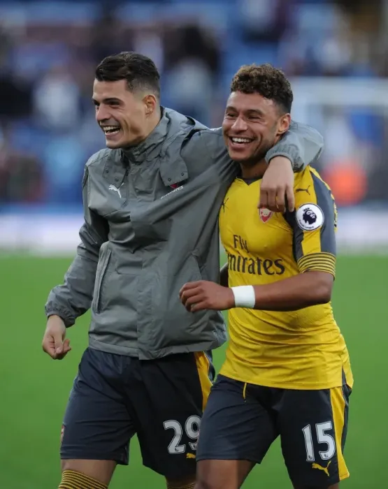 Framed Print : Arsenal's Xhaka and Oxlade-Chamberlain Celebrate Burnley Victory