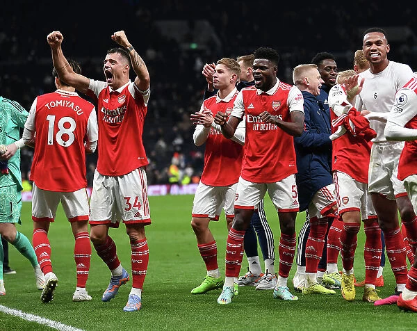 Arsenal's Xhaka and Partey: Triumphant Victory Celebration vs. Tottenham in Premier League