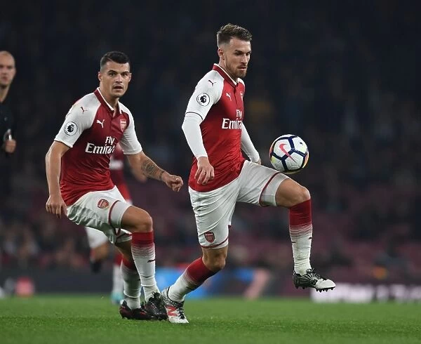 Arsenal's Xhaka and Ramsey in Action: Arsenal v West Bromwich Albion, Premier League 2017-18