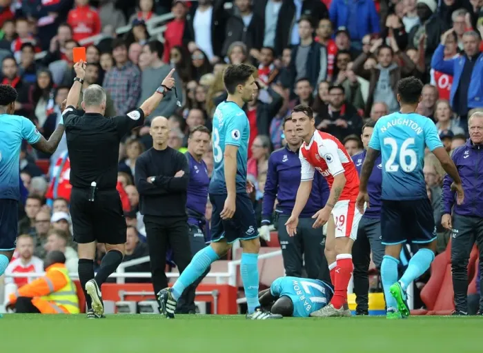 Framed Print : Arsenal's Xhaka Red-Carded in Premier League Clash Against Swansea City