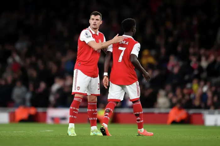Framed Print : Arsenal's Xhaka and Saka: A Moment of Connection Amidst the Intense Arsenal v Chelsea Rivalry (2022-23) Framed Print : Arsenal's Xhaka and Saka: A Moment of Connection Amidst the Intense Arsenal v Chelsea Rivalry (2022-23)
