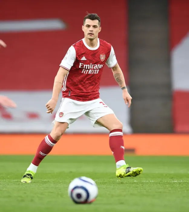 Framed Print : Arsenal's Xhaka Shines in Empty Emirates Derby Against Tottenham