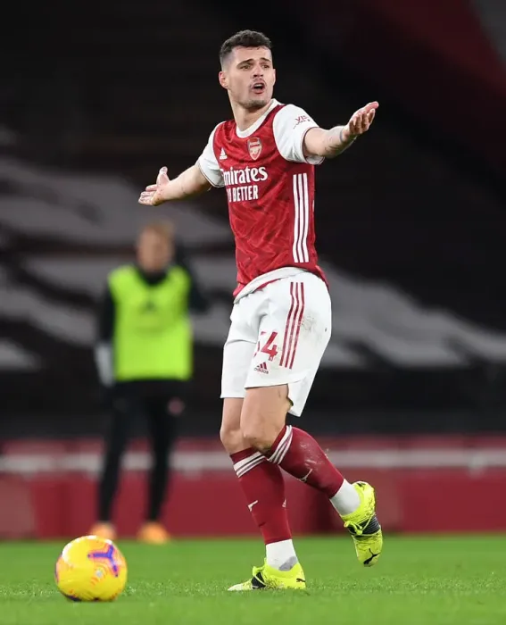 Framed Print : Arsenal's Xhaka Shines in Empty Emirates as Gunners Take on Manchester United (2020-21) Framed Print : Arsenal's Xhaka Shines in Empty Emirates as Gunners Take on Manchester United (2020-21)