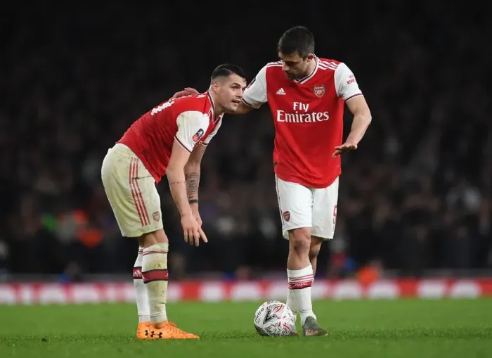 Framed Print : Arsenal's Xhaka and Sokratis in Action Against Leeds United in FA Cup Third Round Framed Print : Arsenal's Xhaka and Sokratis in Action Against Leeds United in FA Cup Third Round
