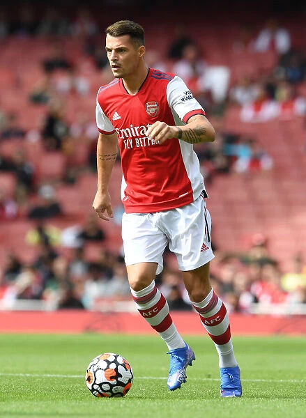 Arsenal's Xhaka Stands Firm: A Battle of Spirits in Arsenal vs. Chelsea Pre-Season Clash at Emirates Stadium