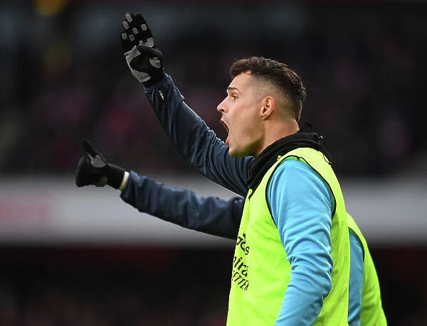 Arsenal's Xhaka Watches from the Sidelines During Arsenal v AFC Bournemouth Premier League Match, 2022-23