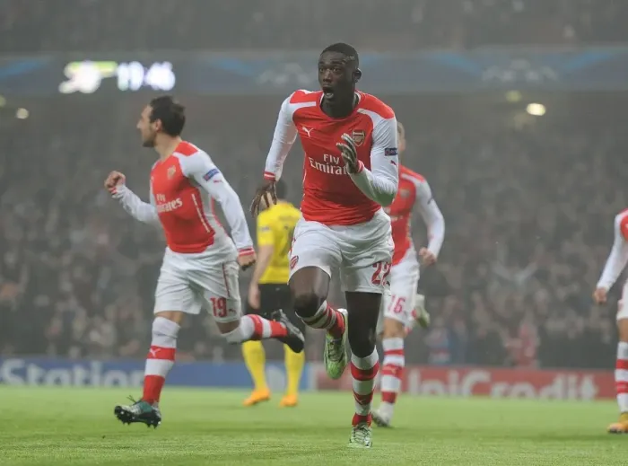 Framed Print : Arsenal's Yaya Sanogo Scores in Champions League Clash Against Borussia Dortmund Framed Print : Arsenal's Yaya Sanogo Scores in Champions League Clash Against Borussia Dortmund