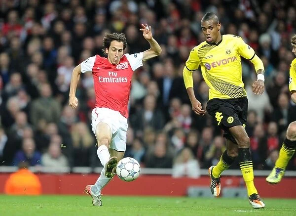 Arsenal's Yossi Benayoun Scores Duo Against Borussia Dortmund's Felipe Santana: 2-0 Group F Victory at Emirates Stadium (November 23, 2011)