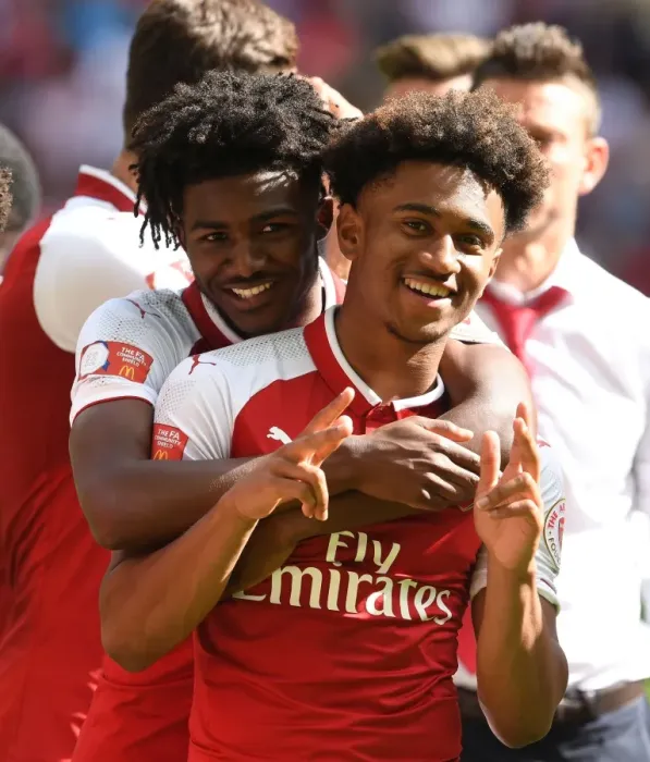 Framed Print : Arsenal's Young Stars Maitland-Niles and Nelson Celebrate FA Community Shield Victory