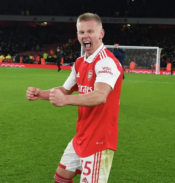 Framed Print : Arsenal's Zinchenko Leads Victory Celebrations Over Manchester United in Premier League Showdown Framed Print : Arsenal's Zinchenko Leads Victory Celebrations Over Manchester United in Premier League Showdown