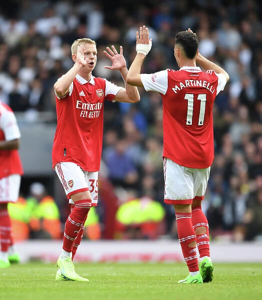 Arsenal's Zinchenko and Martinelli in Action against Tottenham in the 2022-23 Premier League
