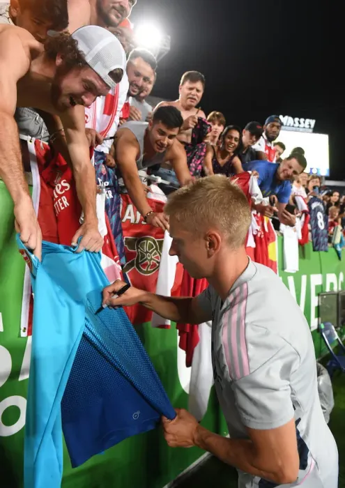 Framed Print : Arsenal's Zinchenko Mingles with Fans, Signs Autographs after Arsenal v Chelsea Florida Cup Match Framed Print : Arsenal's Zinchenko Mingles with Fans, Signs Autographs after Arsenal v Chelsea Florida Cup Match
