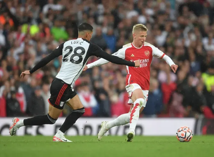 Framed Print : Arsenal's Zinchenko Outmaneuvers Fulham's Lukic in 2023-24 Premier League Clash