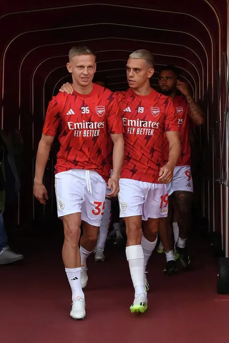 Framed Print : Arsenal's Zinchenko and Trossard Pre-Match Chat: Arsenal FC vs Manchester United, 2023-24 Premier League