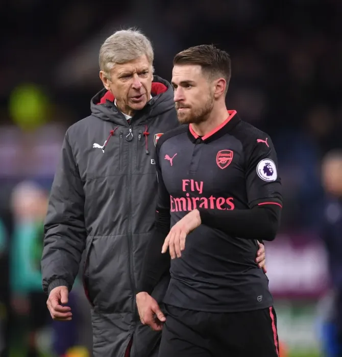 Framed Print : Arsene Wenger and Aaron Ramsey: Savoring Arsenal's Triumph over Burnley