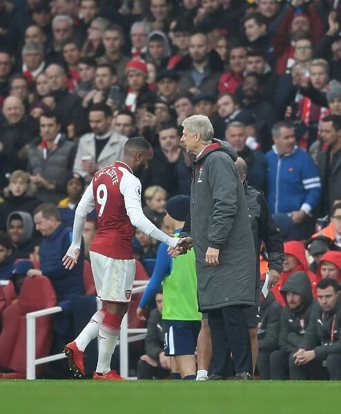 Arsene Wenger and Alexandre Lacazette: A Heartfelt Farewell on the Arsenal Touchline (Arsenal v Tottenham Hotspur 2017-18)