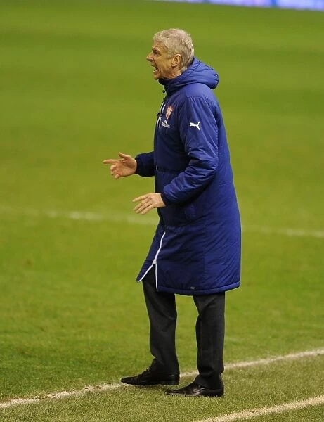 Arsene Wenger at Anfield: A Clash of Premier League Titans (Liverpool vs. Arsenal, 2014)