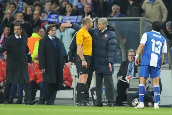 Framed Print : Arsene Wenger Argues with Referee Martin Hansson After Porto's Second Goal in UEFA Champions League Clash