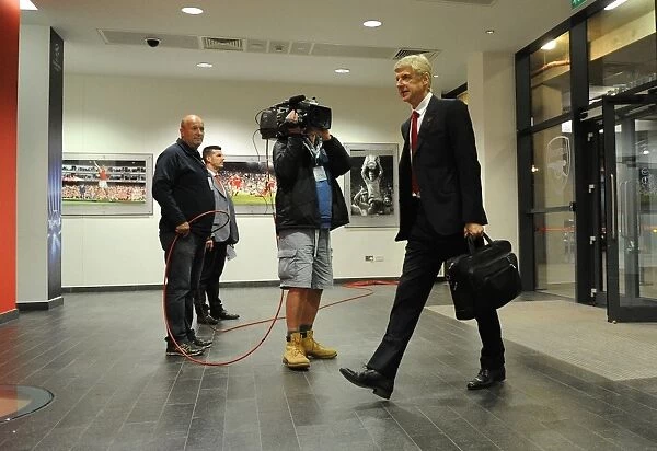 Arsene Wenger Arrives at Emirates Stadium Ahead of Arsenal vs. Besiktas UCL Showdown (2014)