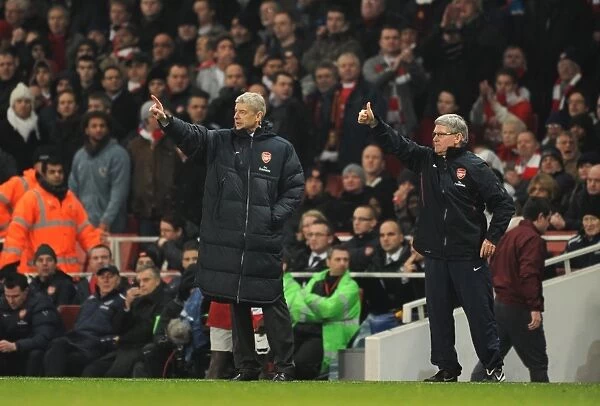 Arsene Wenger the Arsenal Manager and his assistant Pat Rice. Arsenal 0: 0 Manchester City