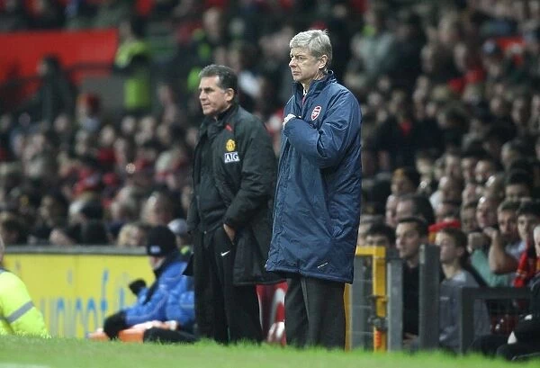 Arsene Wenger the Arsenal Manager and Carloe Queiros (Man Utd 1st Team Coach)