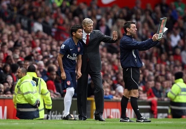 Arsene Wenger the Arsenal Manager gives Eduardo