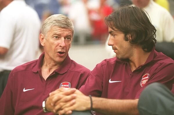 Arsene Wenger the Arsenal Manager with Robert Pires. Ajax 0:1 Arsenal