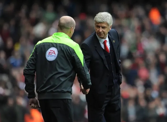 Framed Print : Arsene Wenger the Arsenal Manager shakes hands with Lee Mason the Fourth Official before the match