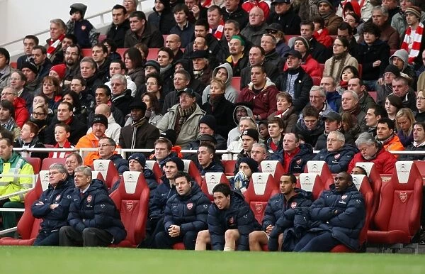 Arsene Wenger the Arsenal Manager sits in the dug out. Arsenal 2: 0 Sunderland