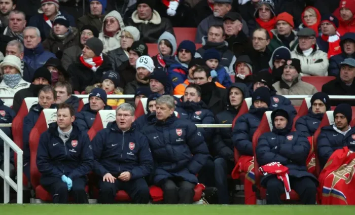 Framed Print : Arsene Wenger the Arsenal Manager sits in the dug out with Pat Rice (Assistant) Framed Print : Arsene Wenger the Arsenal Manager sits in the dug out with Pat Rice (Assistant)