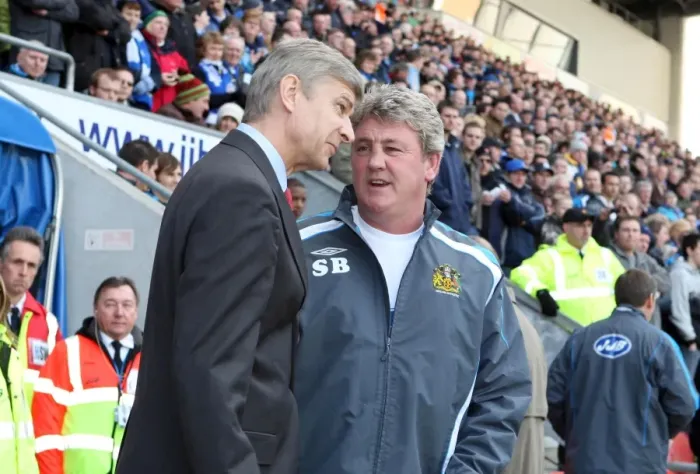 Framed Print : Arsene Wenger the Arsenal Manager speaks to Steve Bruce the Wigan Manager before the match Framed Print : Arsene Wenger the Arsenal Manager speaks to Steve Bruce the Wigan Manager before the match