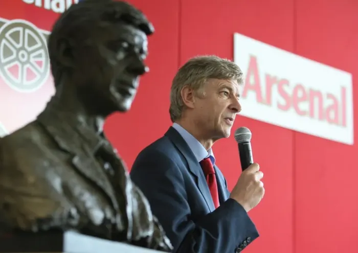 Framed Print : Arsene Wenger the Arsenal Manager standing next to his bust Framed Print : Arsene Wenger the Arsenal Manager standing next to his bust