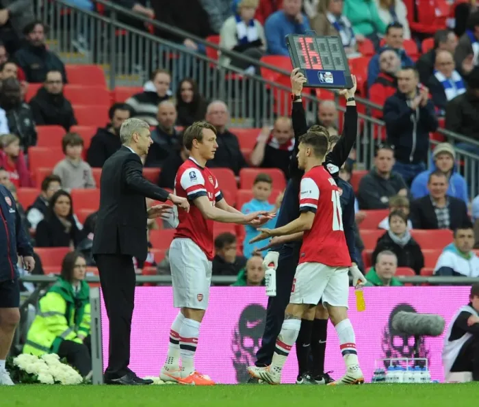 Framed Print : Arsene Wenger the Arsenal Manager subs Kim Kallstrom for Aaron Ramsey. Arsenal 1: 1 Wigan Athletic Framed Print : Arsene Wenger the Arsenal Manager subs Kim Kallstrom for Aaron Ramsey. Arsenal 1: 1 Wigan Athletic