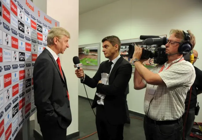 Framed Print : Arsene Wenger the Arsenal Manager talks to Sky before the match. Arsenal 3: 1 Stoke City