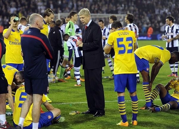 Arsene Wenger and Arsenal Players Before Penalty Shootout vs. West Bromwich Albion - Capital One Cup, 2013