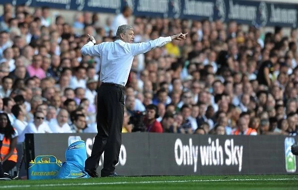 Arsene Wenger: Arsenal's Boss Faces Tottenham Hotspur in Intense Barclays Premier League Clash (2:1)