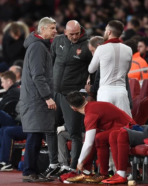 Arsene Wenger Consults Aaron Ramsey During Tense Arsenal v Chelsea Carabao Cup Showdown
