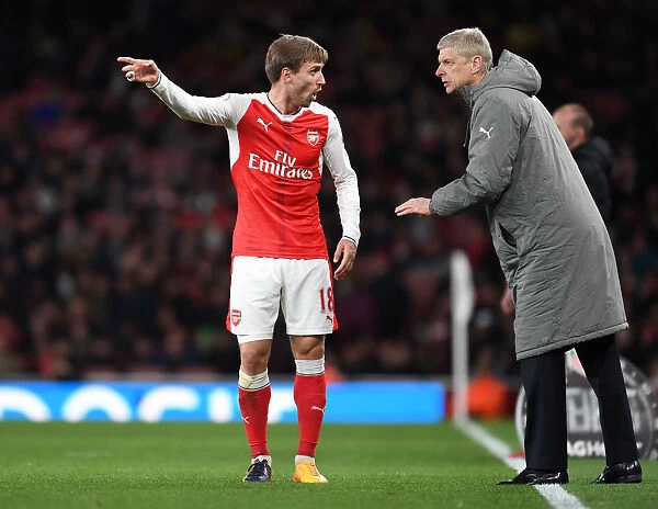Arsene Wenger Consults Nacho Monreal during Arsenal's Clash against Leicester City (2016-17)