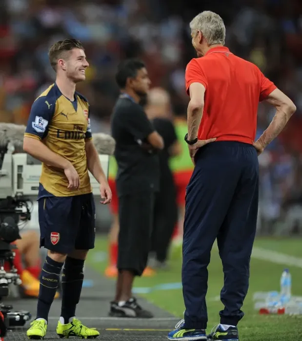Framed Print : Arsene Wenger and Dan Crowley: A Light-Hearted Moment Amidst Arsenal's Victory in the Barclays Asia Trophy Framed Print : Arsene Wenger and Dan Crowley: A Light-Hearted Moment Amidst Arsenal's Victory in the Barclays Asia Trophy
