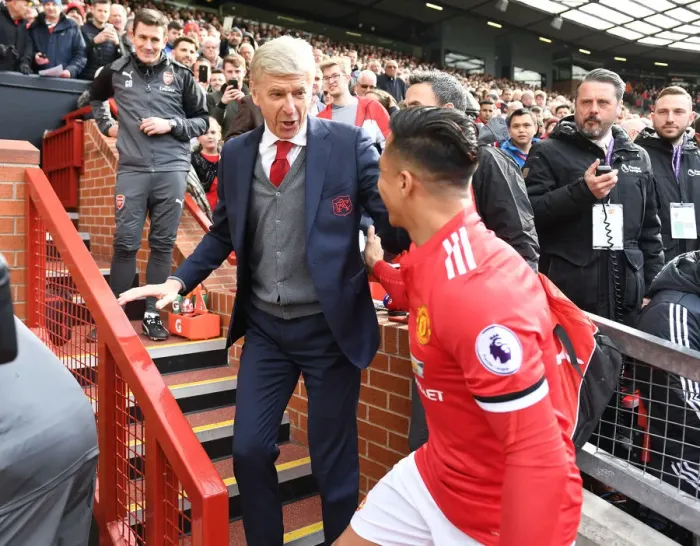 Framed Print : Arsene Wenger Embraces Alexis Sanchez Before Manchester United vs. Arsenal (2017-18)