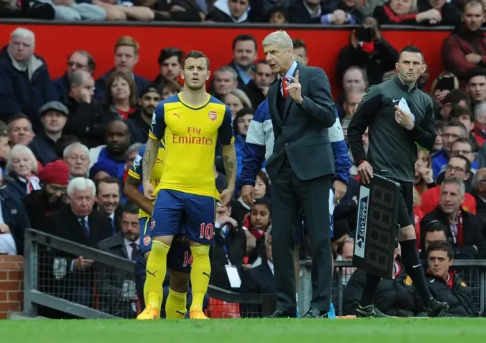 Framed Print : Arsene Wenger Guides Jack Wilshere: Arsenal's Managerial Moment at Old Trafford (2014-15) Framed Print : Arsene Wenger Guides Jack Wilshere: Arsenal's Managerial Moment at Old Trafford (2014-15)