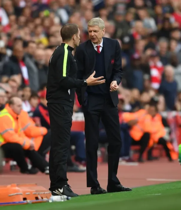 Framed Print : Arsene Wenger in Intense Discussion with Fourth Official Craig Pawson during Arsenal vs Manchester United (2016-17)