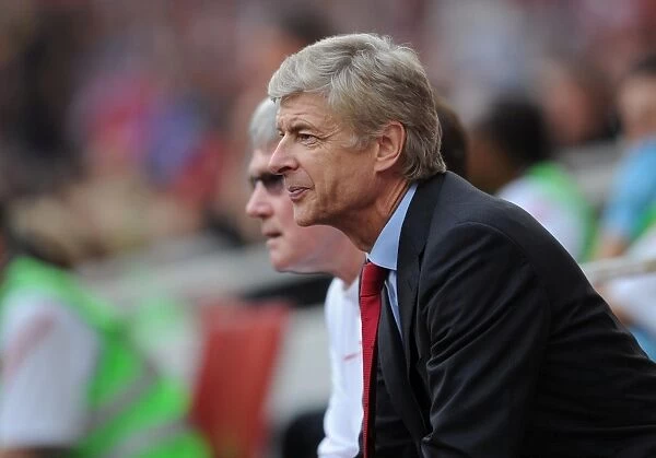 Arsene Wenger Leads Arsenal Against Bolton Wanderers in Premier League (2011)