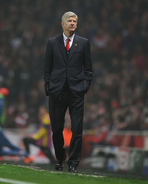 Arsene Wenger Leads Arsenal Against Borussia Dortmund in Champions League Clash (2014-15)