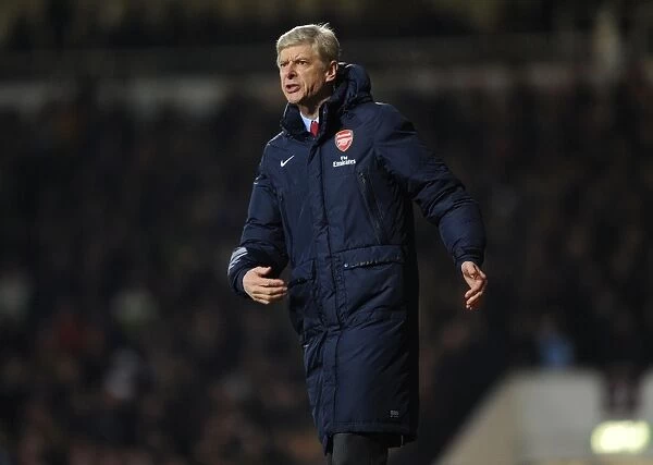 Arsene Wenger Leads Arsenal in Premier League Clash against West Ham United (2013-14)