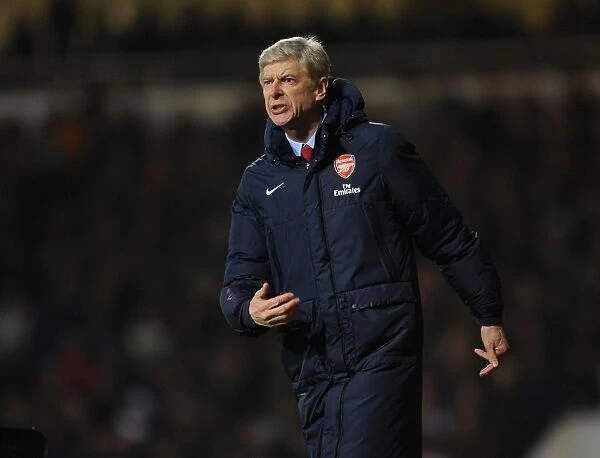 Arsene Wenger Leads Arsenal in Premier League Clash Against West Ham United (2013-14)